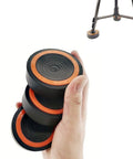 Hand holding three-piece anti vibration suppression pads for telescope mounts with 7.6 cm diameter, improves stability.