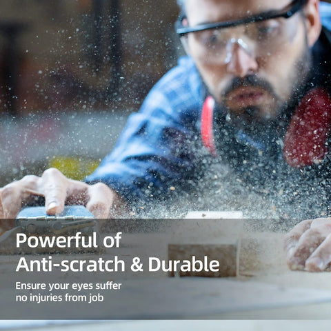 Person using ANSI Z87.1 Anti Fog Safety Goggles With Adjustable Frames for woodworking, dust in the air, focused on eye protection.