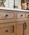 10 Pack Antique Black Cabinet Handles For Kitchen And Bedroom, 4 Inch Screw Spacing 102mm, shown on wood cabinets