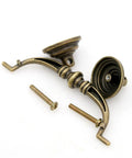 Four Piece Vintage Antique Brass Bail Pull Handle Set For Wooden Drawers Cabinets And Cupboards, shown with screws.