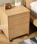 Wooden bedside cabinet on Eight Pack 2 Inch Antique Brass Ball Caster Wheels With Brakes, shown installed for mobility