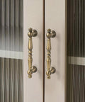 2 Pack Antique Brass Cabinet Drawer Pulls 3.75 Inch Vintage Bronze Bar Style Furniture Handles installed on glass cupboard doors