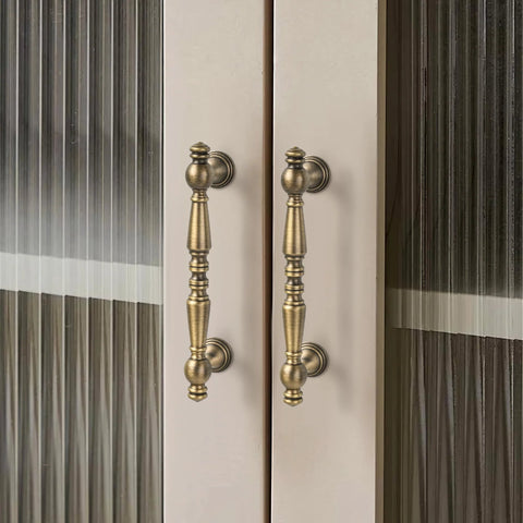 2 Pack Antique Brass Cabinet Drawer Pulls 3.75 Inch Vintage Bronze Bar Style Furniture Handles installed on glass cupboard doors