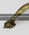 Close-up of 4 Pack Antique Brass Cabinet Handles With Vintage Decorative Drawer Pulls For Dresser Cupboard Wardrobe, zinc alloy material