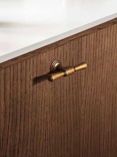 Antique Brass Cabinet Knobs Five Pack Single Hole Vintage Drawer Knobs Zinc Alloy Handles installed on wood cabinet