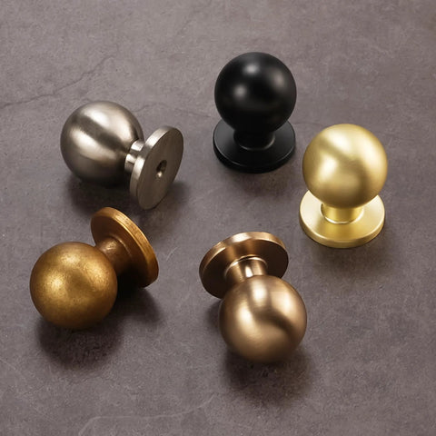 Set of knobs including two pack antique brass kitchen cabinet knobs and vintage drawer knobs in aged bronze zinc alloy hardware.