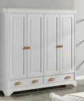 Antique Brass Cabinet Knobs 6 Pack on white wardrobe, Heavy Duty Zinc Alloy Vintage Hardware for Dressers and Vanities.