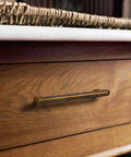 Close-up of installed 3-inch antique brass cabinet pull on a wooden drawer, part of the 10 Pack Antique Brass Cabinet Pulls 3 Inch 76mm.