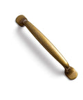 Set Of Six Traditional Five Inch Center To Center Antique Brass Cabinet Pulls With Curved Classic Design For Vintage Inspired Kitchens