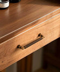 Antique Brass Cabinet Pull on Dresser, 5-Inch Center, Knurled Design, Zinc Alloy, Installed View, Ideal for Bathroom Cabinets and Furniture.