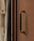 Antique Brass Cabinet Pulls Set Five Inch Center Knurled Vintage Drawer Pulls Installed on Wooden Door