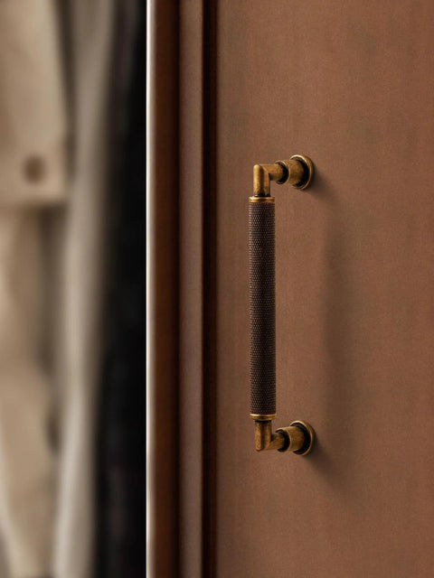 Antique Brass Cabinet Pulls Set Five Inch Center Knurled Vintage Drawer Pulls Installed on Wooden Door