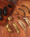 Assorted cabinet pulls, including Antique Brass Zinc Alloy Cabinet Pulls 2.5 Inch Center Hole 64mm Heavy Duty Cupboard Handles Set of 6.