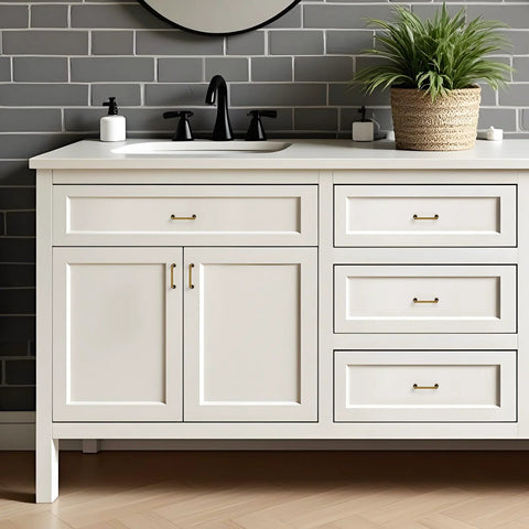 White bathroom vanity with Antique Brass Cabinet Pulls 3 Inch Center 10 Pack Zinc Alloy Handles, vintage style hardware installed on drawers.