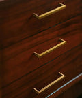 Antique Brass Cabinet Pulls Set Of 6, 5 Inch Center To Center, Minimalist Vintage Drawer Handles installed on wooden drawers.