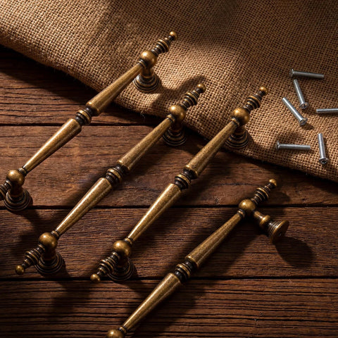Antique Brass Cabinet Pulls Set Of 6, 7.32 Inch Long With 5.04 Inch Center-To-Center on burlap fabric and wooden surface