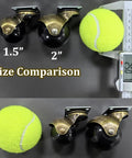 Size comparison of Ball Caster Wheels Set Of 4, 2 Inch Swivel Furniture Castors with Antique Brass Top Plate next to tennis ball.