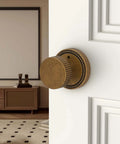 4 Pack Antique Brass Privacy Door Knobs With Lock For Bedroom Or Bathroom installed on white door