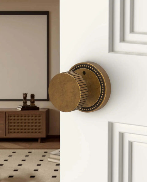 4 Pack Antique Brass Privacy Door Knobs With Lock For Bedroom Or Bathroom installed on white door