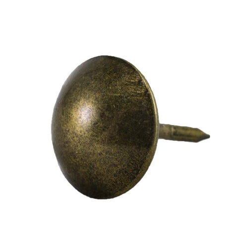 Antique brass upholstery tack with 7/16 inch head and 1/2 inch shank, used to secure fabric, leather, and trim to wood frames and panels.