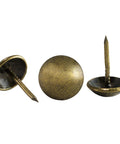 Antique brass upholstery tacks secure fabric, leather, and trim to wood frames and panels with a durable, decorative finish, shown close-up