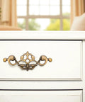 4 Pack 3.25 Inch Center To Center Antique Bronze Bail Drawer Pulls on white dresser