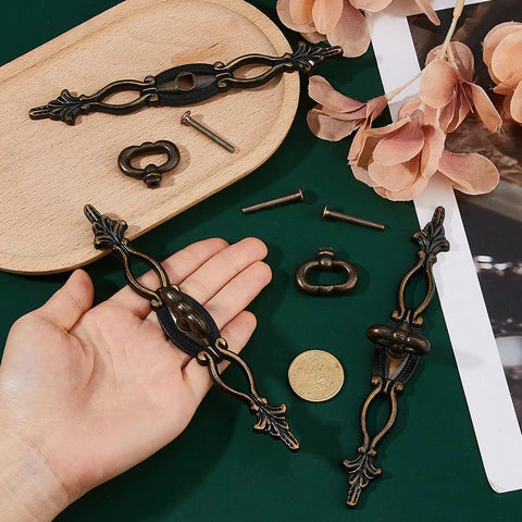 Vintage Style Alloy Cabinet Handles With Plate Six Point Three Inch Long 160mm 22mm Wide Durable Brushed Finish displayed on table