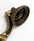 Close-up of 4.5 Inch Center To Center Antique Bronze Drawer Pull showing detail of bail drop swing handle and mounting point.