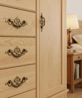 Dressers with 4 Pack 3.25 Inch Center To Center Antique Bronze Bail Drawer Pulls Drop Swing Handles installed in bedroom