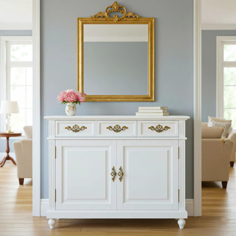White dresser with 4 Pack 3.25 Inch Center To Center Antique Bronze Bail Drawer Pulls, in a living room with a gold mirror and blue walls.
