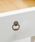 Vintage Drop Ring Pulls Set of 4 in Antique Bronze on white drawer