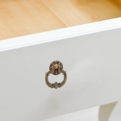 Vintage Drop Ring Pulls Set of 4 in Antique Bronze on white drawer