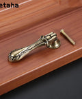 Antique bronze teardrop pendant pull on wooden surface with mounting screw, 4 Pack Vintage Teardrop Pendant Pulls With Antique Bronze Finish Floral Carving Solid Zinc Alloy Handles For Cabinets Dressers Wardrobes Includes Mounting Screws Classic Rustic Hardware For Furniture Decor.