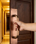 12 Inch Push Pull Door Handles Set for Sliding Barn Doors and High Traffic Areas in Antique Copper Finish being used