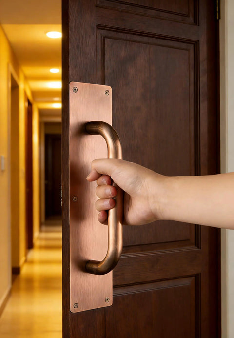 12 Inch Push Pull Door Handles Set for Sliding Barn Doors and High Traffic Areas in Antique Copper Finish being used