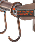 Close-up of Kitchen Utensil Holder Hanger, Pot and Pan Rack Wall Mount in antique copper with two hooks attached.