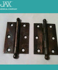 Create an authentic antique patina on bare metal with a quick, water based brown darkener showing aged metal hinges.