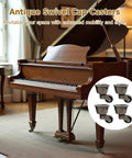 Set Of Four Antique Swivel Cup Casters With Zinc Alloy Construction Universal Round Wheels installed on piano, living room