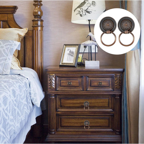 Bedroom scene with wooden nightstand featuring 6 Piece Antique Drawer Pull Ring Set With M4 X 25 Mm Screws Included for vintage decor.