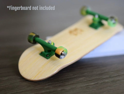 Apex 61D Slim Bowl Fingerboard Wheels With 7.5mm Urethane And ABEC 9 Stealth Bearings, installed on a wooden fingerboard.
