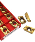 Ten Piece APMT1604 PDER Turning Inserts Tin Coated Carbide For Steel Turning And Milling Dual Edge APKT1604 Inserts With CVD Coating For Finishing And Roughing 0.366 Inch IC 0.187 Inch Thick 85 Degree Nose in red packaging