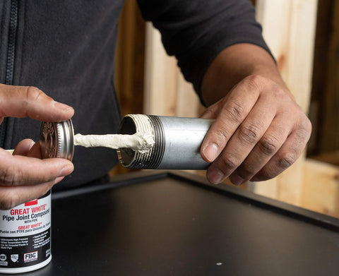 Applying Pro Grade Pipe Joint Compound With PTFE And Brush For Sealing On Metal Threaded Pipe Joint, White Non Hardening Paste