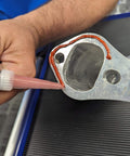 High-Temp Red RTV Silicone Gasket Maker 11 Oz Formed-In-Place Sealant applied on engine component edge