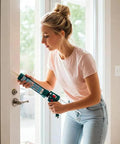 Person applying Premium 100 Percent Silicone Caulk For Windows And Doors White Weatherproof RTV Sealant For Indoor And Outdoor Use