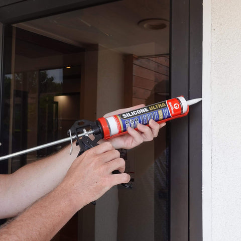 Ultra 100 Percent RTV Silicone Sealant For Exterior Weatherproofing Easy To Apply Neutral Cure Formula being applied to window frame
