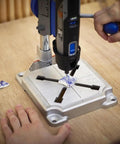 Articulating Drill Press Stand For Rotary Tools drilling ceramic on wooden table with 2 inch depth, 90 degree horizontal position