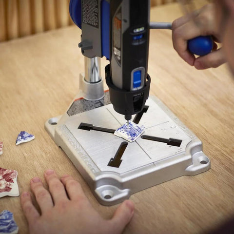 Articulating Drill Press Stand For Rotary Tools drilling ceramic on wooden table with 2 inch depth, 90 degree horizontal position