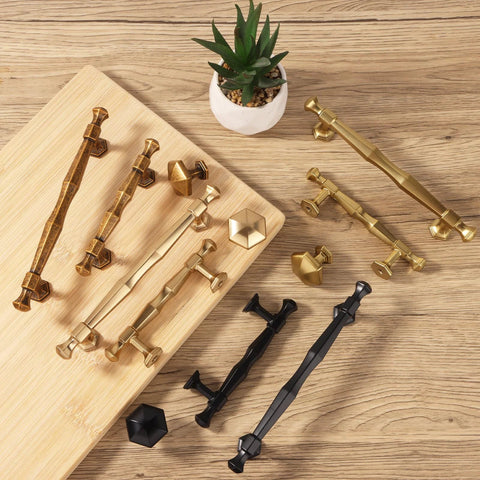 Antique Brass Cabinet Pulls 5 Inch Center To Center Zinc Alloy Solid Drawer Handles For Bedroom And Kitchen 6 Pack With M4 Screws Included displayed on wood surface