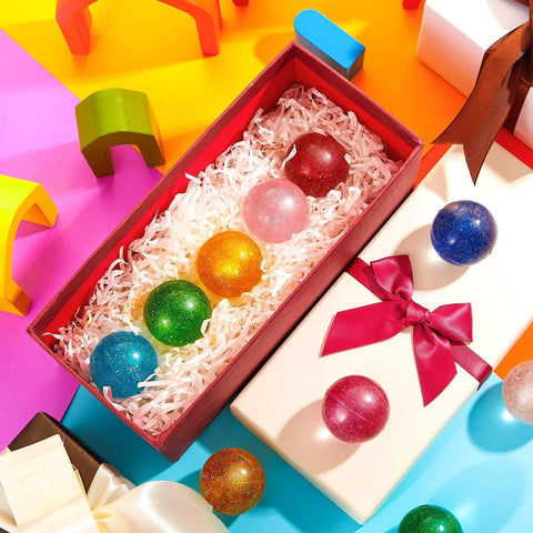 Assorted glitter bouncy balls in colorful box; part of 60 Pcs 45 mm Large Bouncy Balls Glitter Bounce Ball Bulk with Storage Bag Large Bouncy Balls for Goodie Bag Fillers Birthday Party Favors, Assorted Colors(Classic)