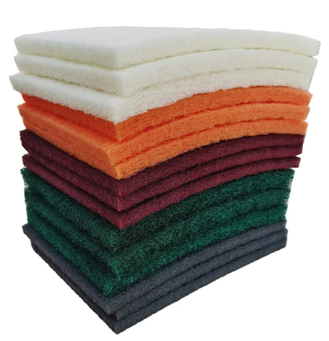 Stack of assorted colored 6x9 inch hand pads coarse to superfine for grills and garden tools